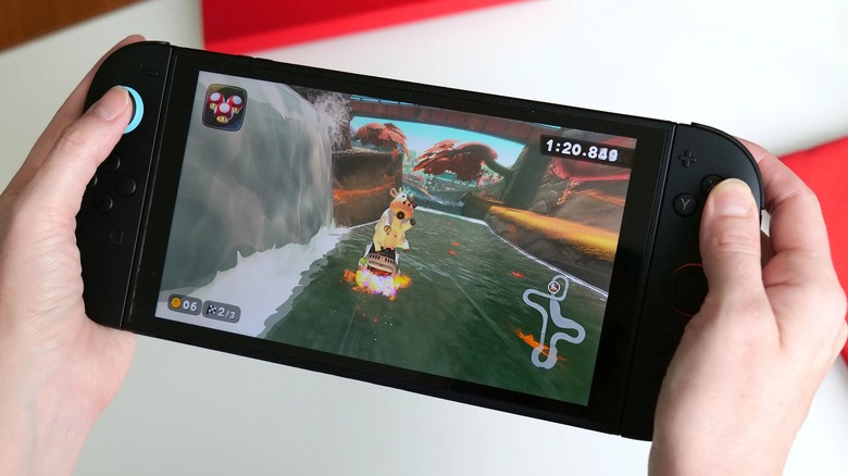 Playing Mario Kart World on the Switch 2 in handheld mode.