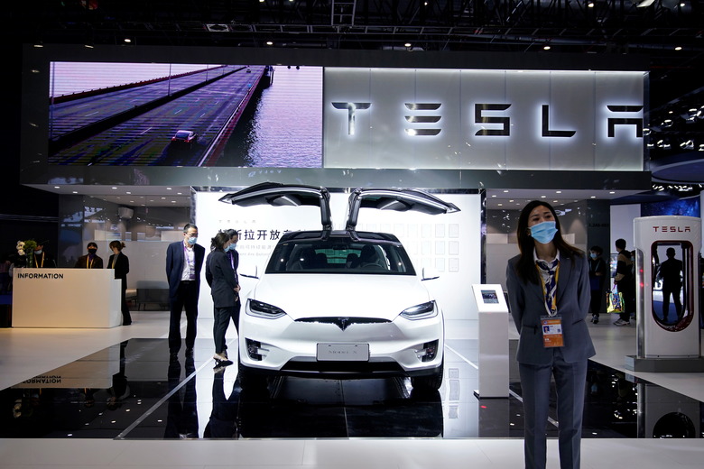 Tesla sign is seen at the third China International Import Expo (CIIE) in Shanghai, China November 5, 2020. REUTERS/Aly Song