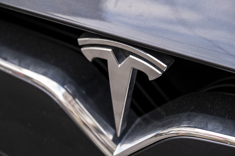 Tesla car badge on 2nd December 2022 in London, United Kingdom. Tesla Inc. is an American multinational automotive and clean energy company which designs and manufactures electric vehicles. (photo by Mike Kemp/In Pictures via Getty Images)