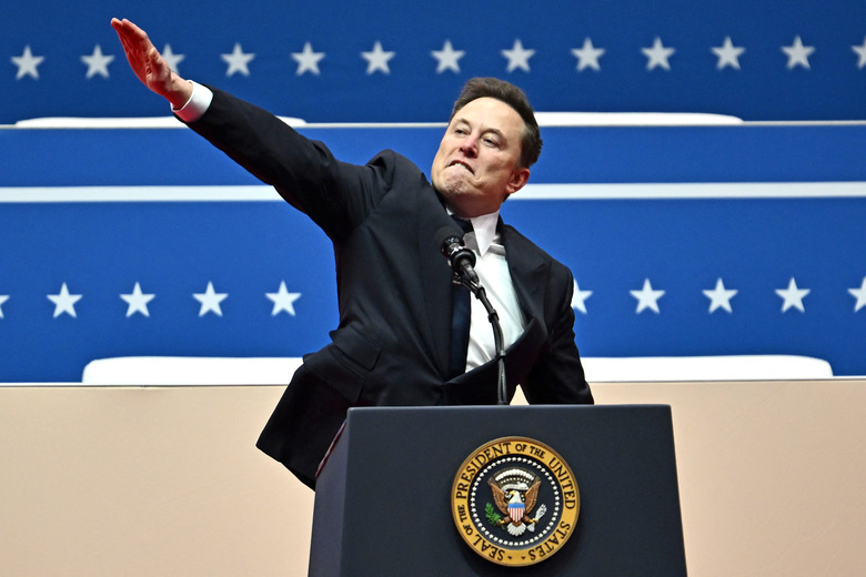 One of Musk's stipulations for receiving $1 trillion is reaching 10 million active FSD subscriptions. (Photo by ANGELA WEISS/AFP via Getty Images)