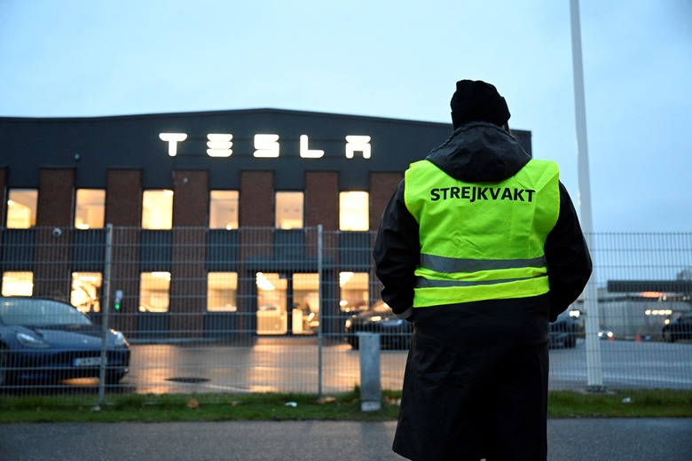 Emma Hansson, chairman of IF Metall Stockholms län stands in front of the electric car company Tesla's Service Center in Segeltorp, south of Stockholm, as workers strike for the signing of a collective agreement on October 27, 2023. (Photo by Jessica Gow/TT / TT NEWS AGENCY / AFP) / Sweden OUT (Photo by JESSICA GOW/TT/TT NEWS AGENCY/AFP via Getty Images)