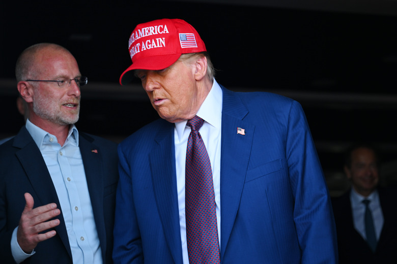 Brendan Carr with Donald Trump in 2024.