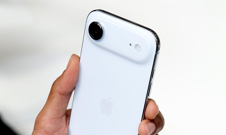 Image of the iPhone Air held aloft