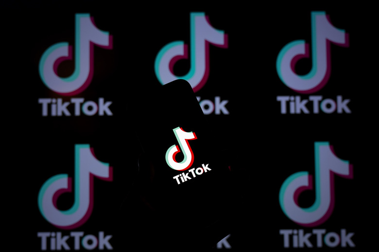 ANKARA, TURKIYE - MAY 16: In this photo illustration, the 'Tiktok' logo is displayed on a mobile phone screen in front of a computer screen displaying the 'Tiktok' logo in Ankara, Turkiye on May 16, 2024. (Photo by Utku Ucrak/Anadolu via Getty Images)