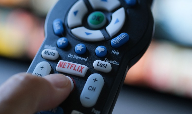 In this illustration photo taken on July 19, 2022 the Netflix logo is seen on a TV remote in Los Angeles. - Netflix reported losing subscribers for the second quarter in a row Tuesday as the streaming giant battles fierce competition and viewer belt tightening, but the company assured investors of better days ahead. The loss of 970,000 paying customers in the most recent quarter was not as big as expected, and left Netflix with just shy of 221 million subscribers. (Photo by Chris DELMAS / AFP) (Photo by CHRIS DELMAS/AFP via Getty Images)