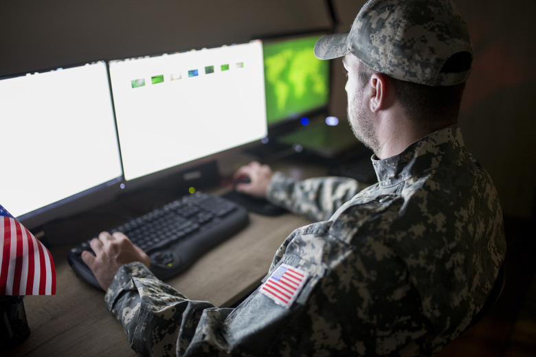 American soldier in headquarter control center