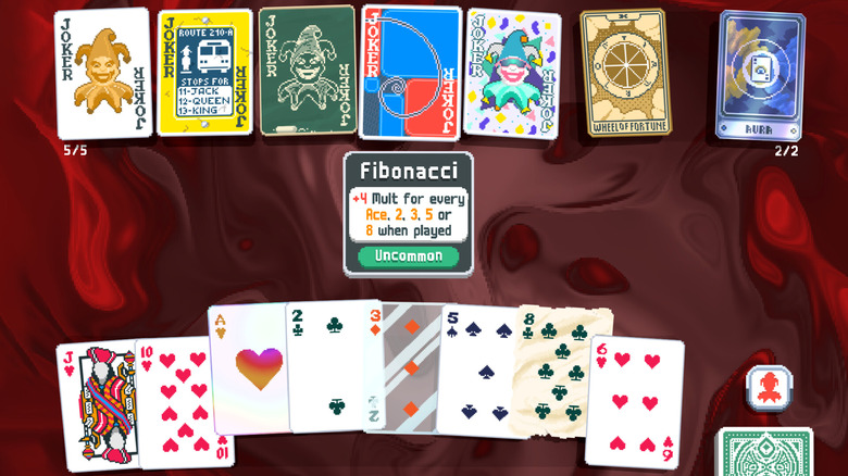 A hand of playing cards and several joker variants in the video game Balatro.
