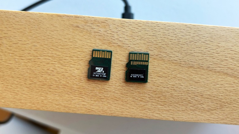 Unlike traditional UHS-I cards, a microSD Express card like the SanDisk model on the right comes with a second row of pins on the back.