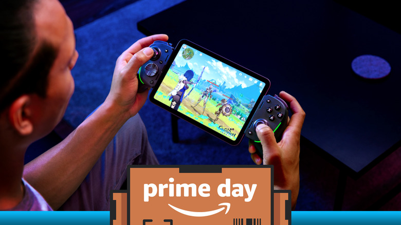 A person playing games on a tablet with the Razer Kishi Ultra controller connected. 