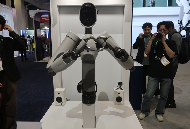 WIRobotics' Allex robot makes a heart sign with its hands.