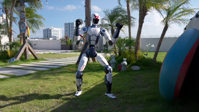 Unitree's R1 humanoid robot takes a fighting stance.