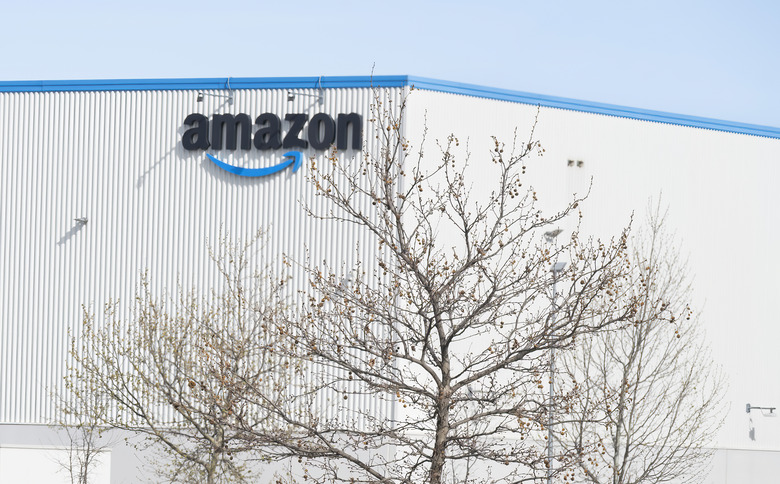 Amazon warehouse workers and organizers gather outside the JFK8 facility on Staten Island, the site of a landmark union election and subsequent NLRB bargaining order in 2026.