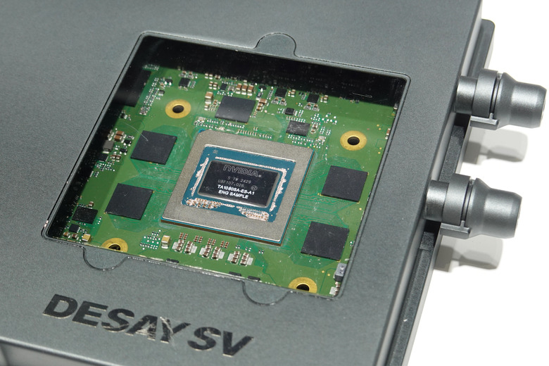 BEIJING, CHINA - JULY 20, 2025 - A chip produced by NVIDIA was displayed in a controller at the NVIDIA booth at the 3rd China International Supply Chain Expo in Beijing, China on July 20, 2025. (Photo credit should read CFOTO/Future Publishing via Getty Images)