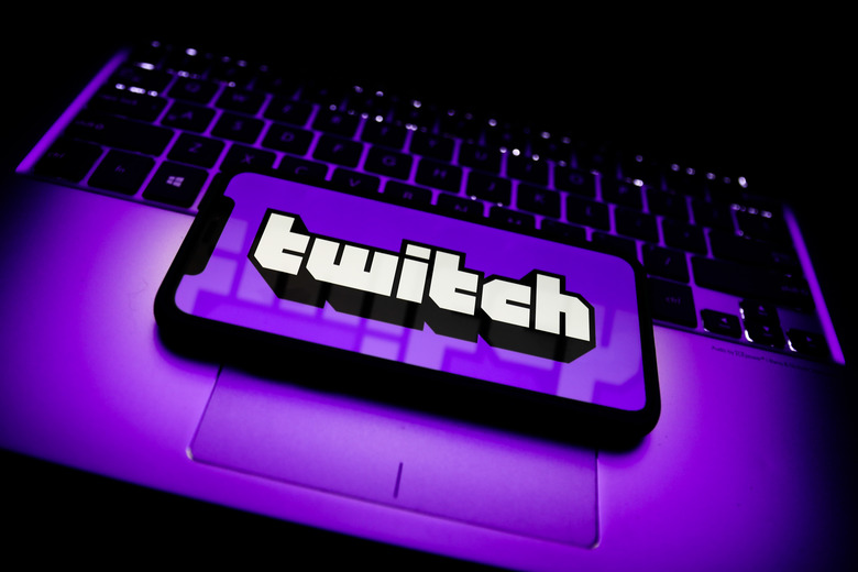 Twitch logo is seen displayed on a phone screen in this illustration photo taken in Krakow, Poland on April 30, 2021. (Photo by Jakub Porzycki/NurPhoto via Getty Images)
