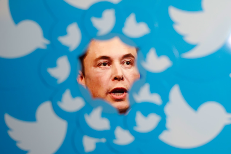 An image of new Twitter owner Elon Musk is seen surrounded by Twitter logos in this photo illustration in Warsaw, Poland on 08 November, 2022. 