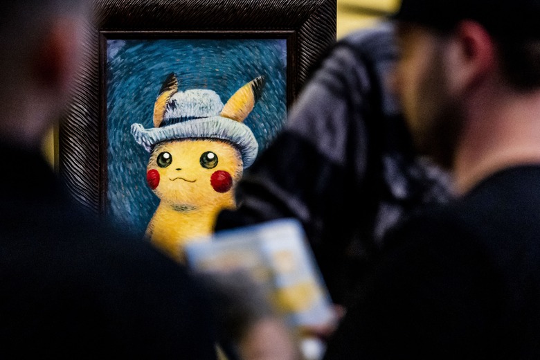 People look at paintings by artists inspired by the Pokemon at the Van Gogh museum in Amsterdam, on September 28, 2023. (Photo by Remko de Waal / ANP / AFP) / Netherlands OUT / RESTRICTED TO EDITORIAL USE - MANDATORY MENTION OF THE ARTIST UPON PUBLICATION - TO ILLUSTRATE THE EVENT AS SPECIFIED IN THE CAPTION (Photo by REMKO DE WAAL/ANP/AFP via Getty Images)