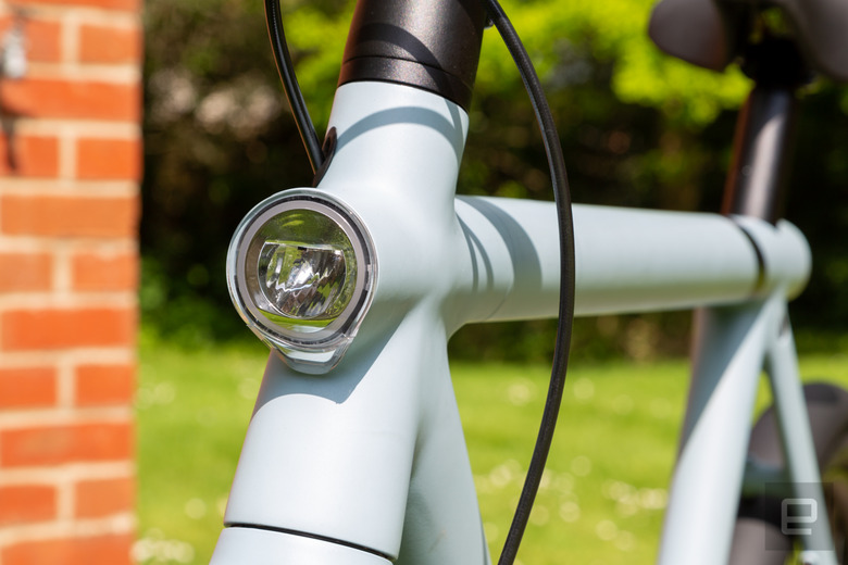 The circular lights match the rest of the bike's design.