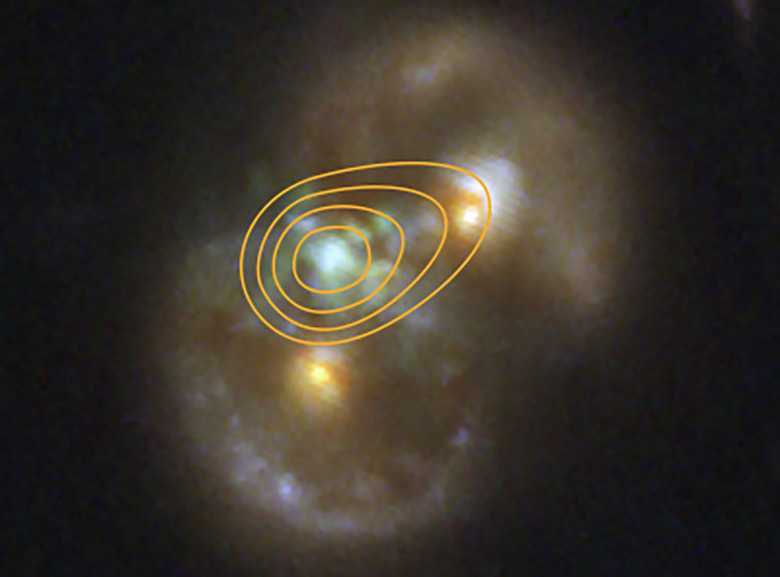 The Infinity Galaxy, overlaid with a contour map indicating the supermassive black hole