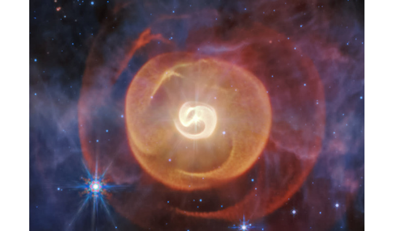 Webb's mid-infrared image shows four coiled shells of dust around a pair of Wolf-Rayet stars known as Apep for the first time