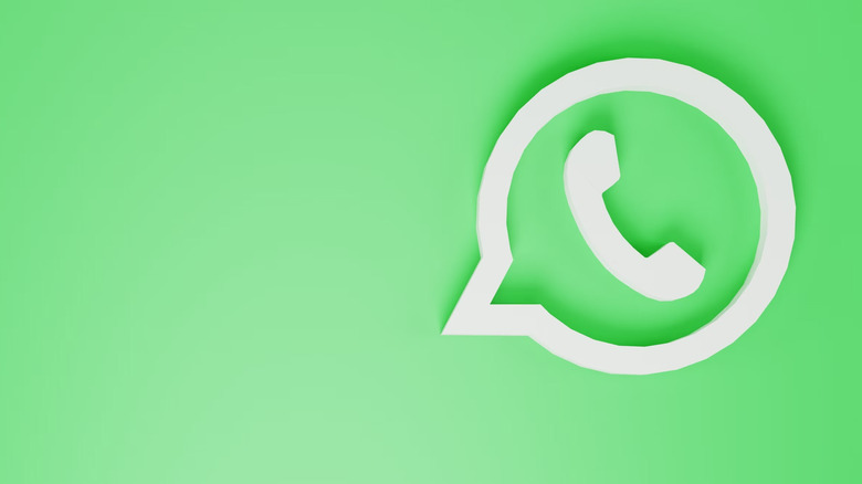 A WhatsApp logo (phone in a chat bubble) against a green background.