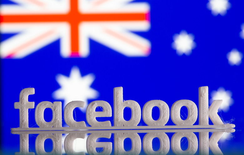 A 3D printed Facebook logo is seen in front of displayed Australia's flag in this illustration photo taken February 18, 2021. REUTERS/Dado Ruvic/Illustration