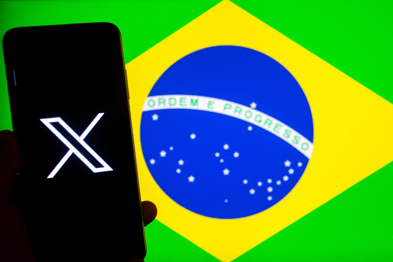 INDIA - 2024/09/03: In this photo illustration, an X(Twitter) logo seen displayed on a smartphone with a flag of Brazil in the background. (Photo Illustration by Avishek Das/SOPA Images/LightRocket via Getty Images)
