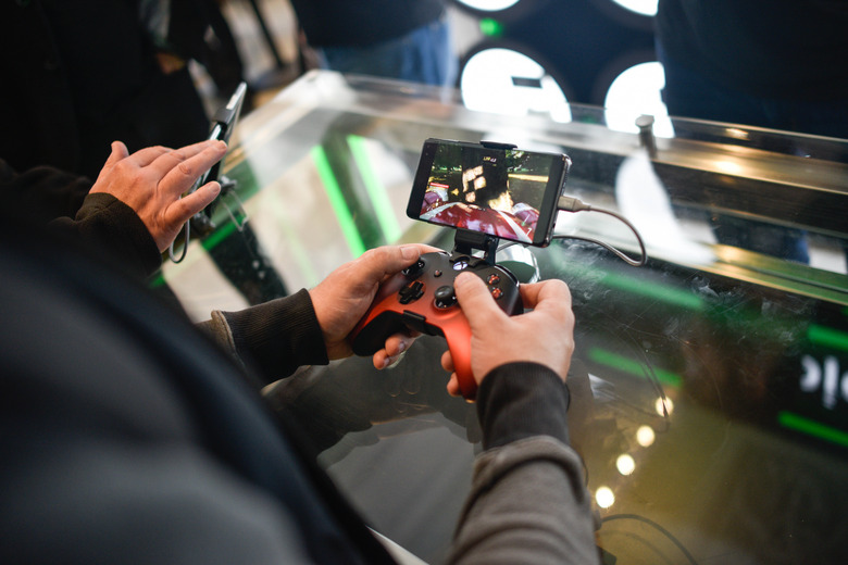 LONDON, ENGLAND - JULY 11: A customer plays on an Xbox xCloud device at the Microsoft store opening on July 11, 2019 in London, England. Microsoft opened their first flagship store in Europe this morning, August 11. (Photo by Peter Summers/Getty Images)