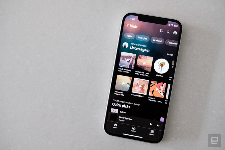 Photo of YouTube Music's iPhone app, against a marble counter. 