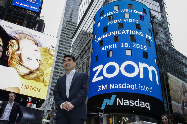Zoom founder Eric Yuan poses in front of the Nasdaq building in NYC.
