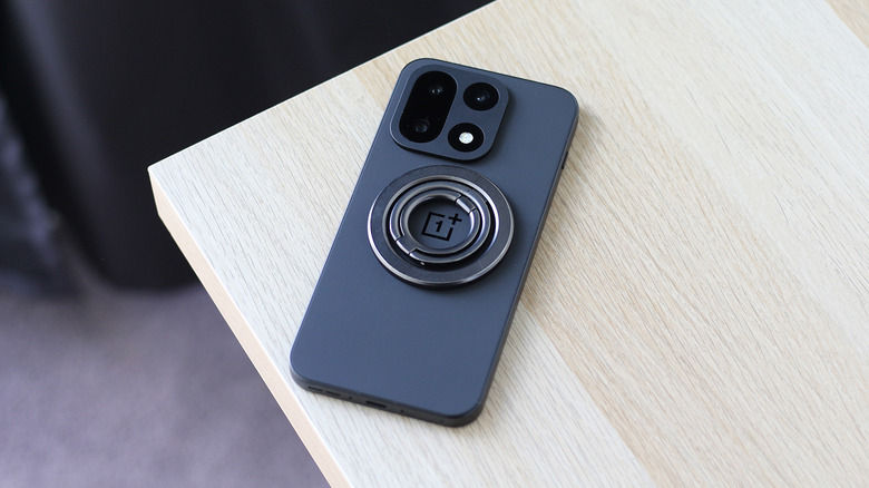 A magnetic ring attachment on an Android phone.