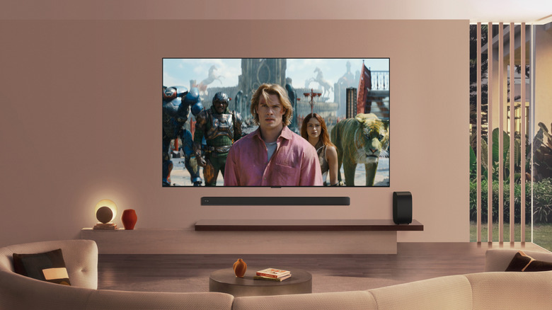 Photo of a cream-colored modern living room with an LG OLED evo TV displaying a still from Prime Video's Masters of the Universe movie.