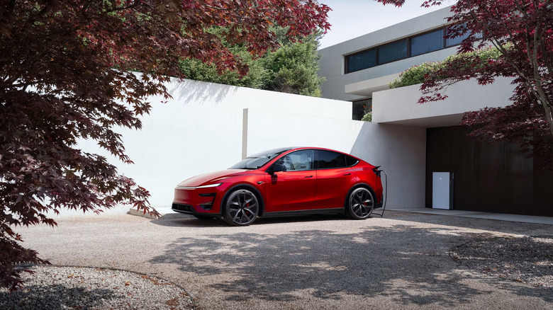 A Tesla Model Y charging at home.