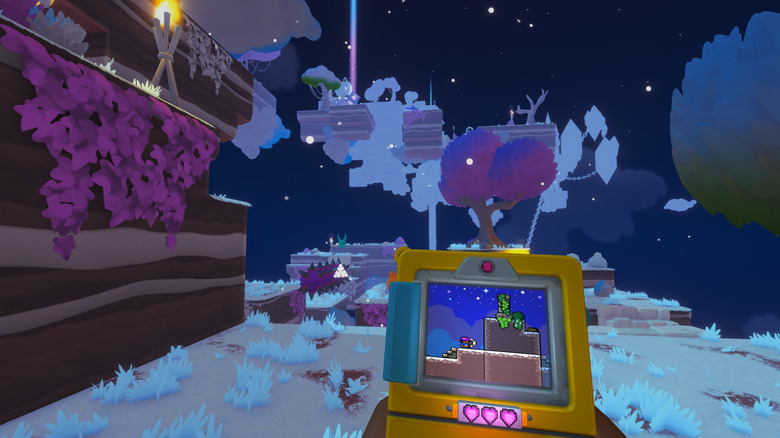 A Game Boy-style gaming device is in the foreground, surrounded by a world from a 3D platform game