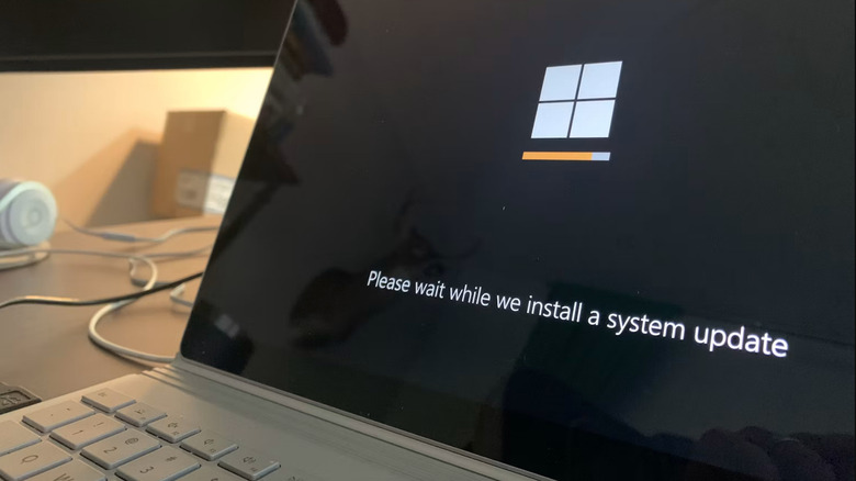 A Windows laptop updating the OS.