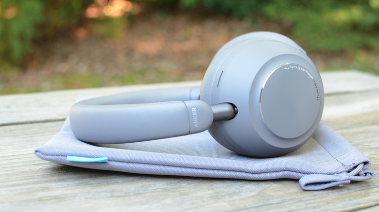 Anker Soundcore Space 2 Pro headphones on a grey bag.