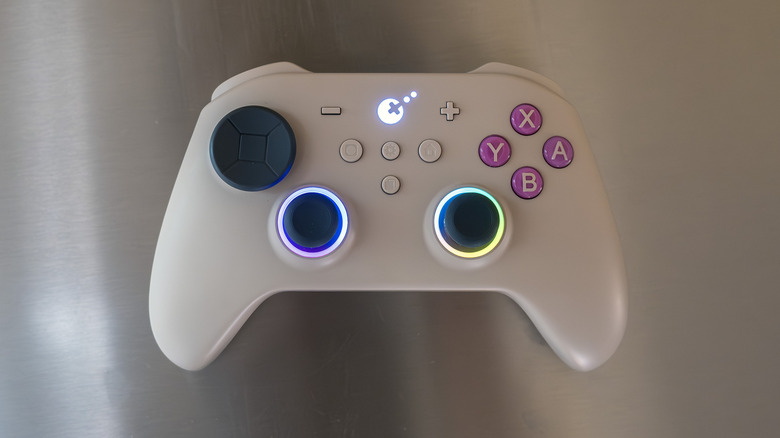 GuliKit TT Pro controller with RGB lights around the sticks.