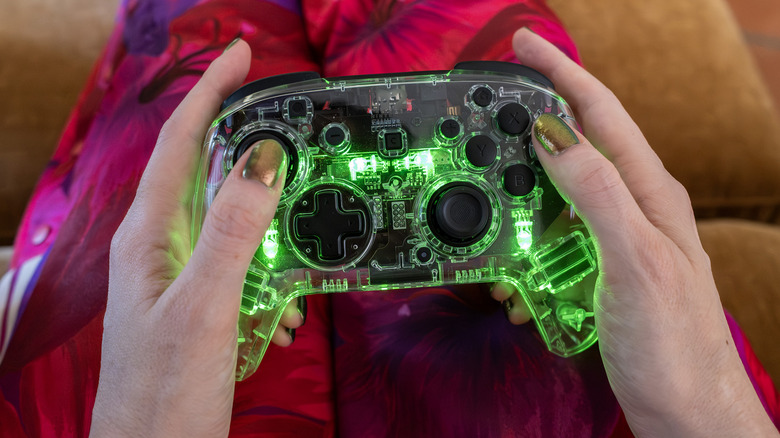 Turtle Beach Afterglow controller with green lighting.