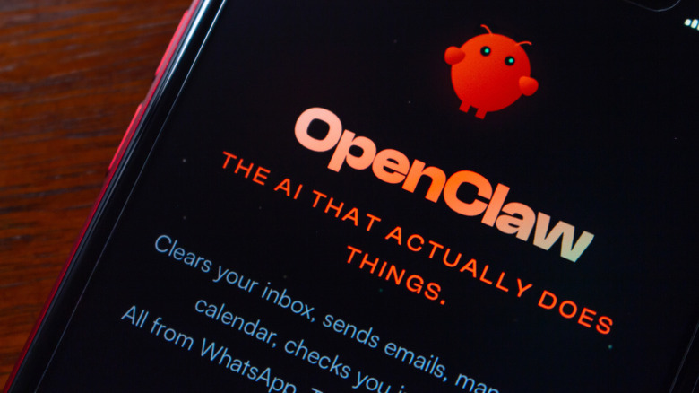 A close-up of a smartphone displaying the OpenClaw AI assistant website.