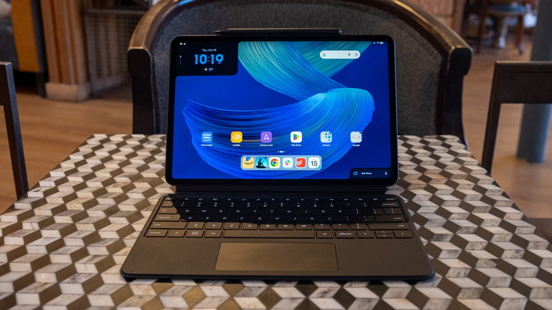 The Alexa Tablet 12 Pro and its keyboard folio attachment sitting on a table.