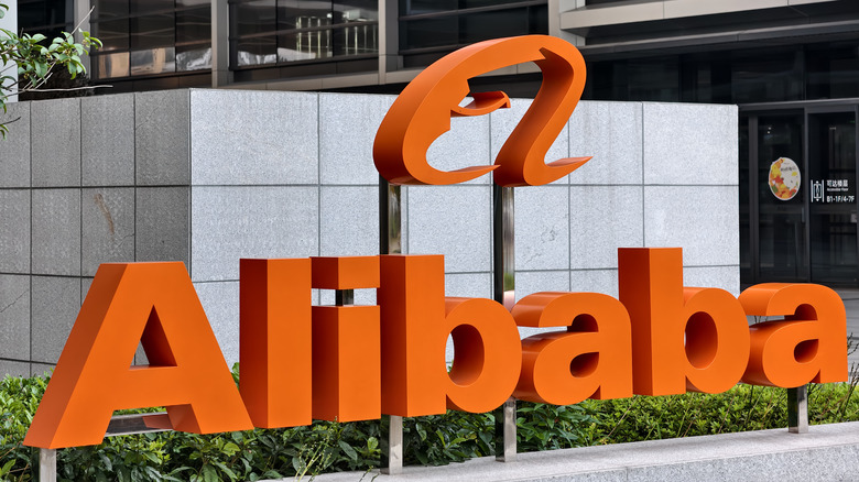 Alibaba logo shown in front of company headquarters