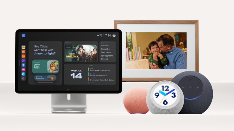 A smart display, photo frame, two speakers and a device with a clock face.