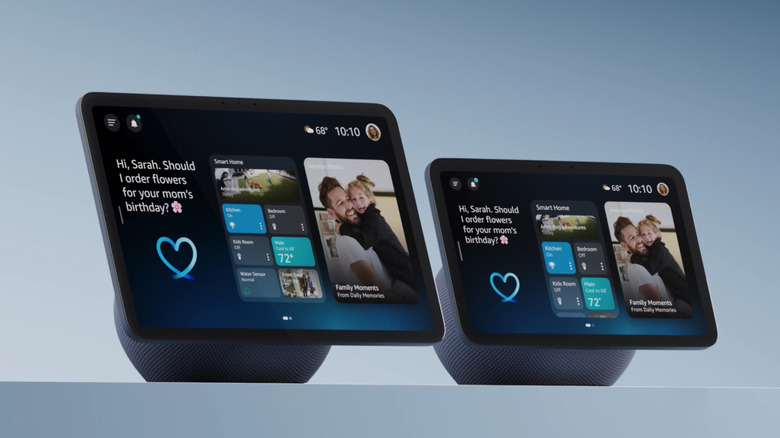Two Amazon Echo Show 11 tablets show Alexa+ responding, "Hi Sarah. Should I order flowers for your mom's birthday?"