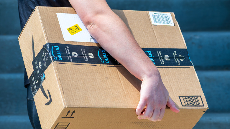 Amazon driver delivering a package
