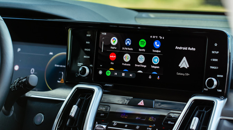 The Android Auto interface, with available apps, on a car screen