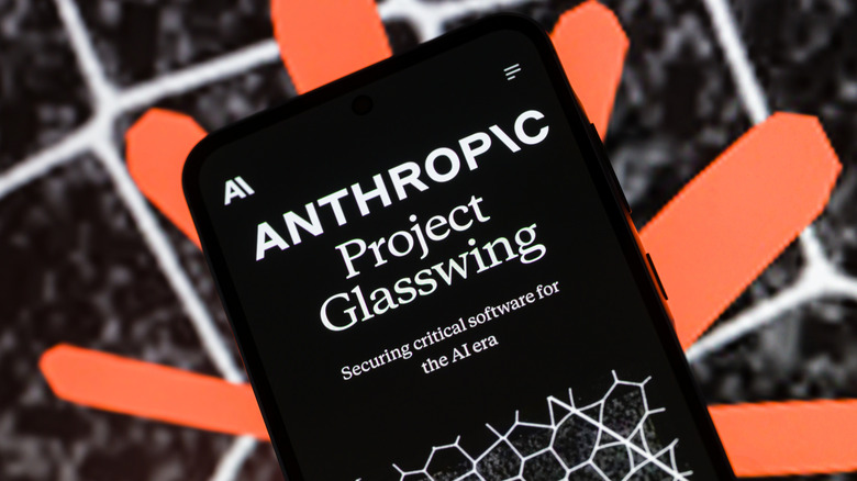An iPhone displays Anthropic's Project Glasswing website with the Claude icon behind the device in the background.