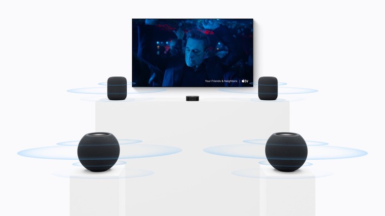 A pair of HomePod mini 2 and a pair of HomePod 2 paired with an Apple TV to create a surround sound system.