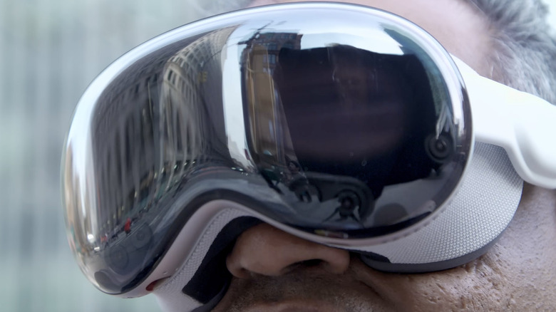 Apple's Vision Pro is shown from the front worn by a user