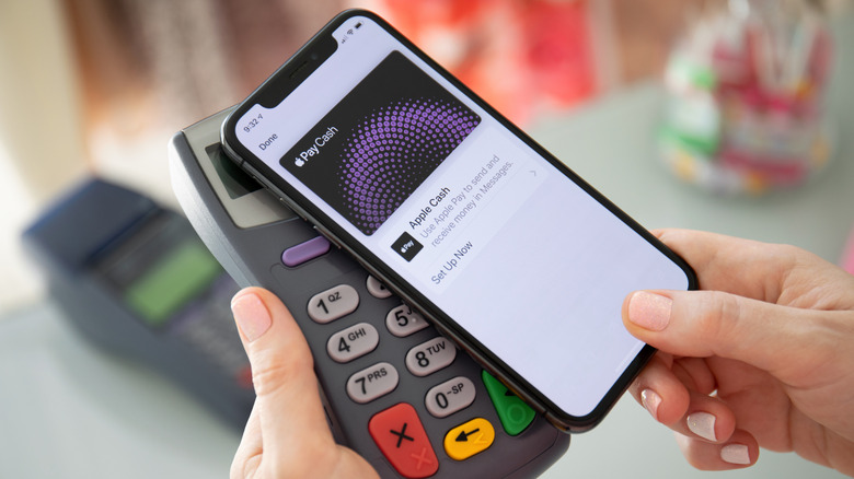 Apple Cash on an iPhone being used to make an NFC purchase.
