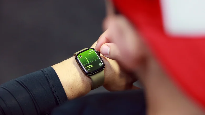 A person looking at their Exercise stats on the Apple Watch Series 12.