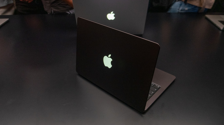 The lid of Apple's new MacBook Pro with its glowing Apple logo.